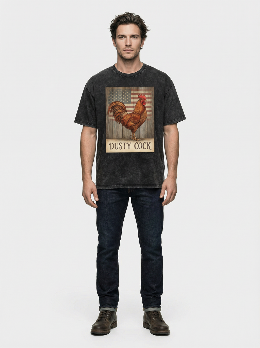 Man wearing a black t-shirt with a rooster graphic and 'Dusty Cock' text on a white background