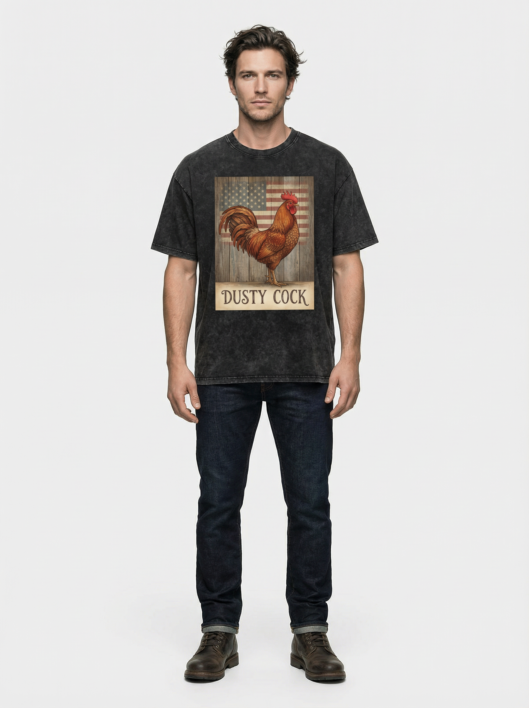 Man wearing a black t-shirt with a rooster graphic and 'Dusty Cock' text on a white background